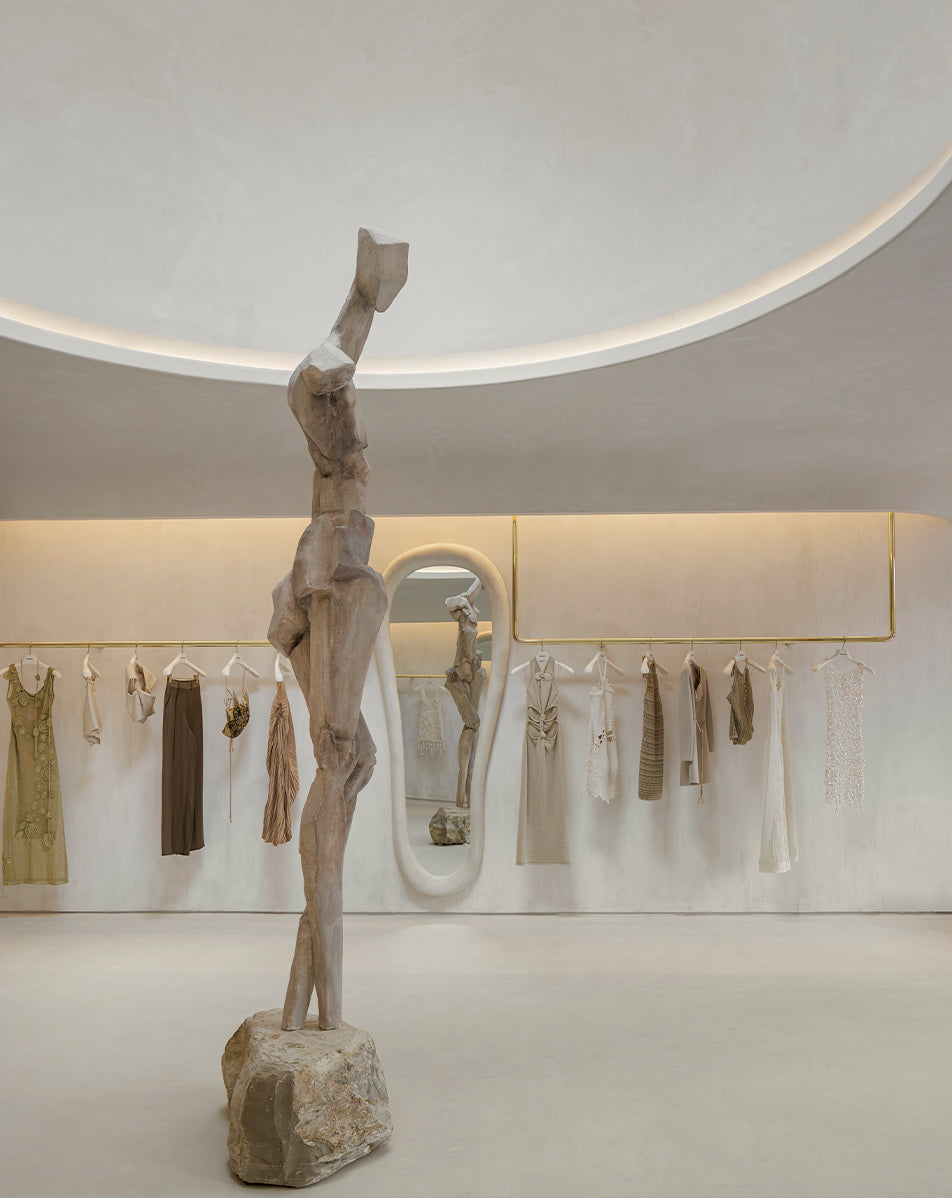 Modern showroom using limewash paint to display clothing using lime wall paint 103+100