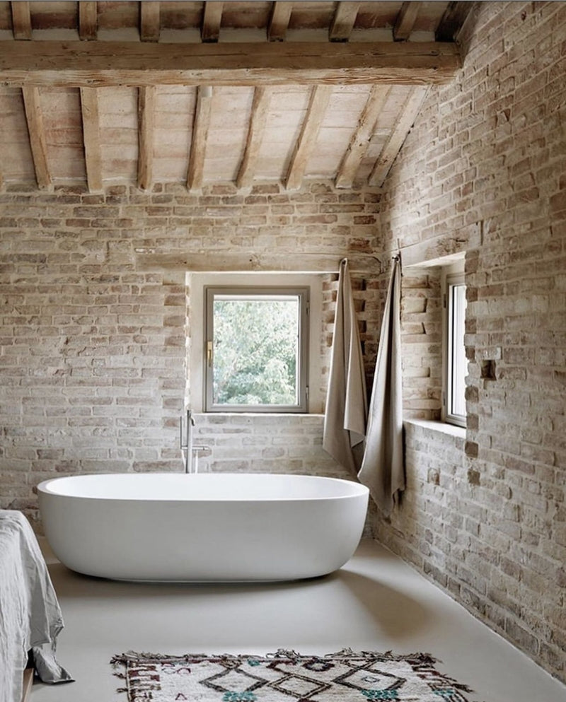 Brick and Wood bath house using limewash paint 177