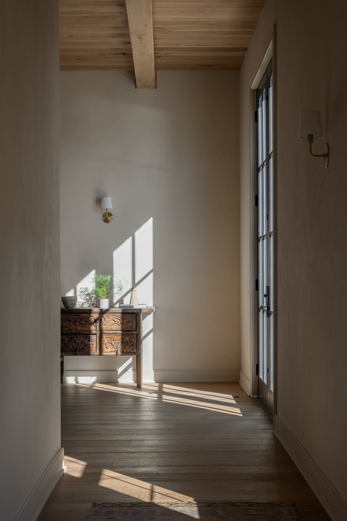 Striking hallway using limewash velvet paint